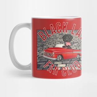 Cute Black Lab driving classic truck on gray brick Mug